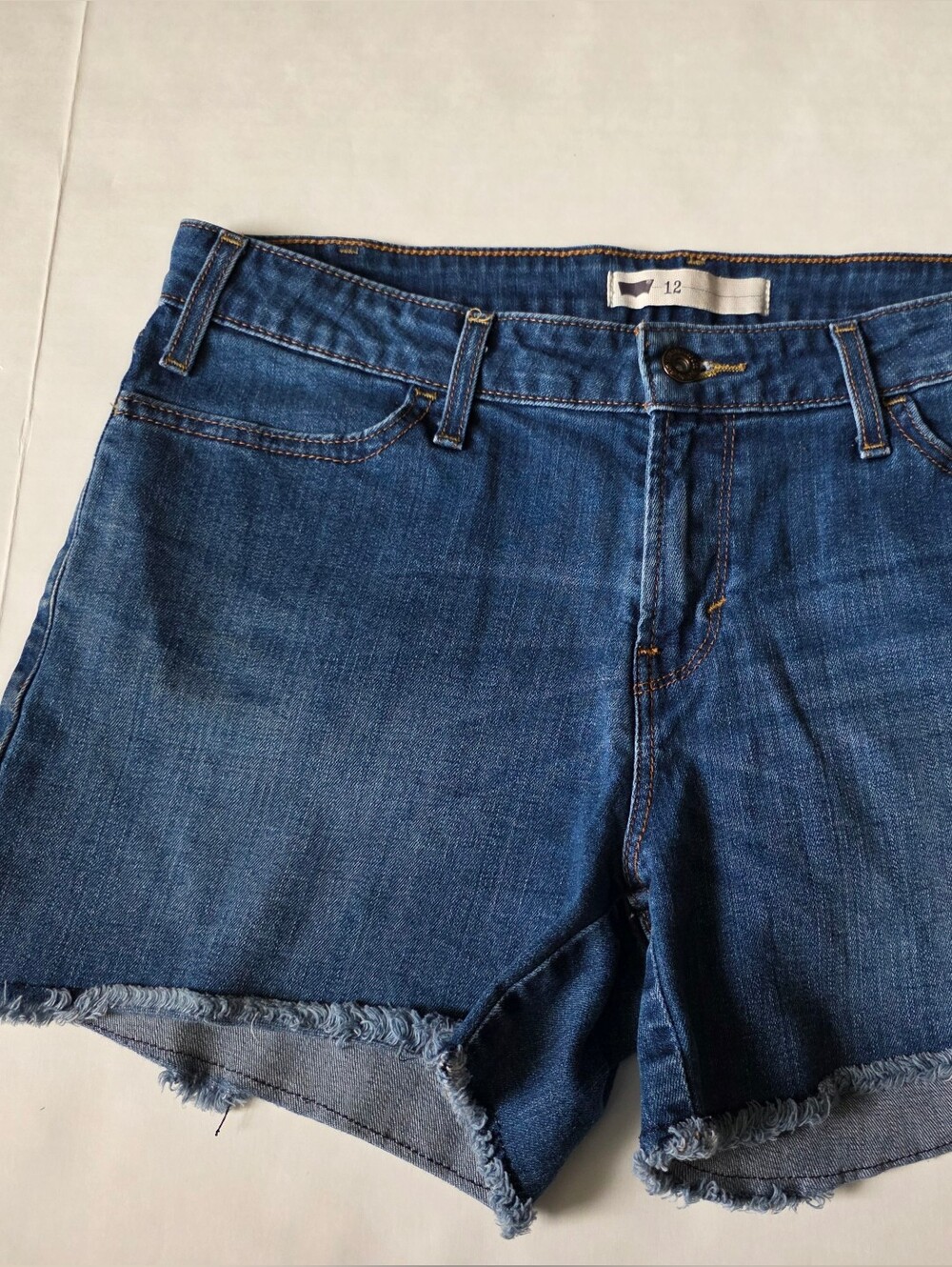 Levi's Medium Blue Denim Jeans with Red Brand Tab, Size 12, Used.
